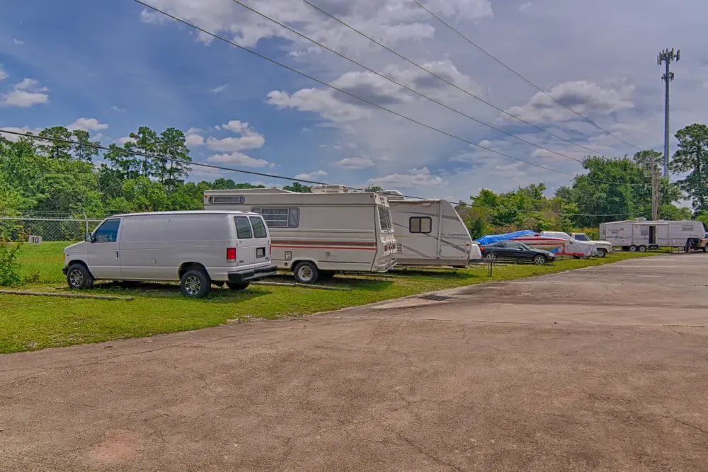 Outdoor RV and vehicle storage at Lakewood Mini Storage.