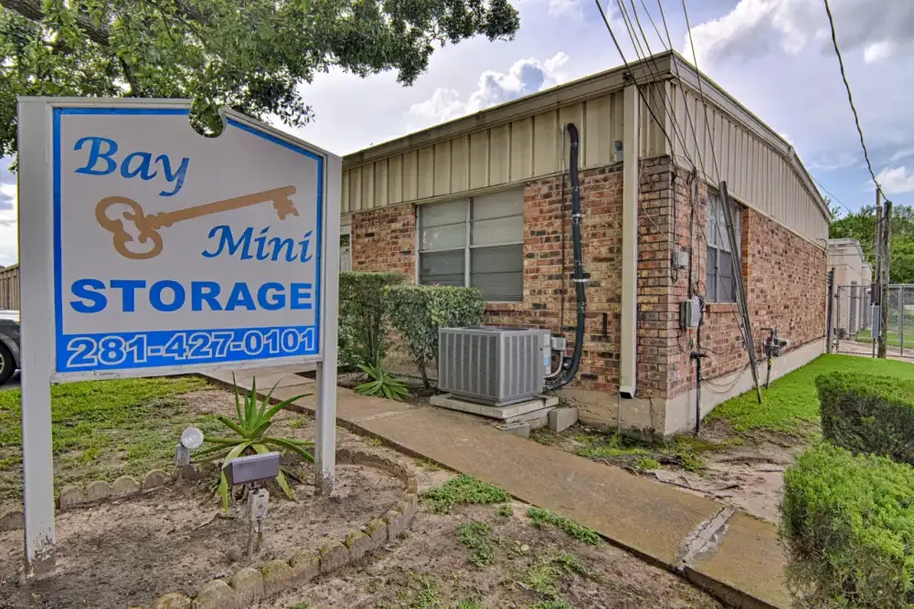 Bay Mini Storage facility front office and road sign.