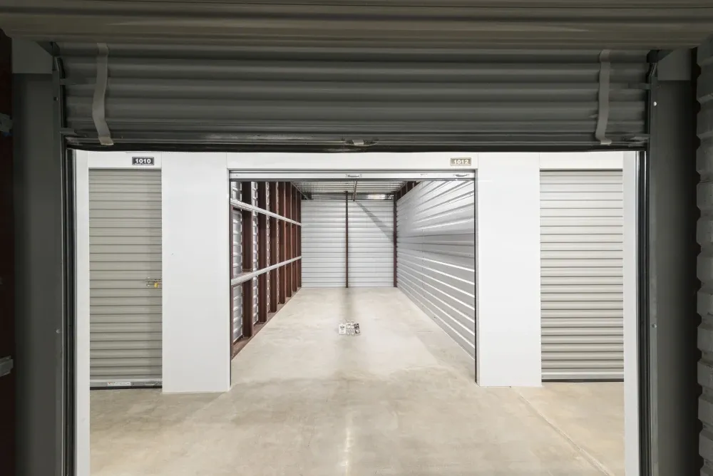 Opened climate-controlled storage unit will roll-up doors at Bee Cave Storage.