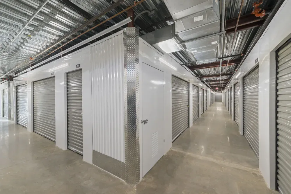 Indoor, climate-controlled storage hallway at Bee Cave Storage.