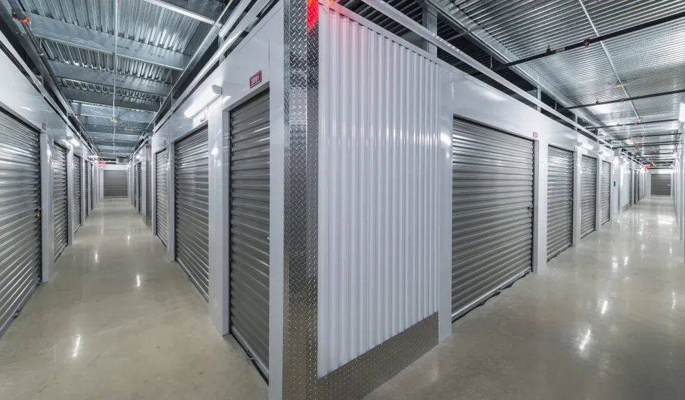 Indoor storage units with roll-up doors at Bergstrom Storage.