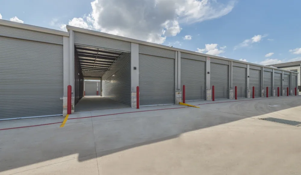 Outdoor storage with drive-up access and covered loading area at Bergstrom Storage.