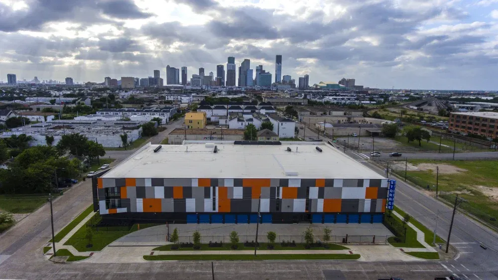 Overhead view of the EaDo Storage facility and its surrounding landscape.