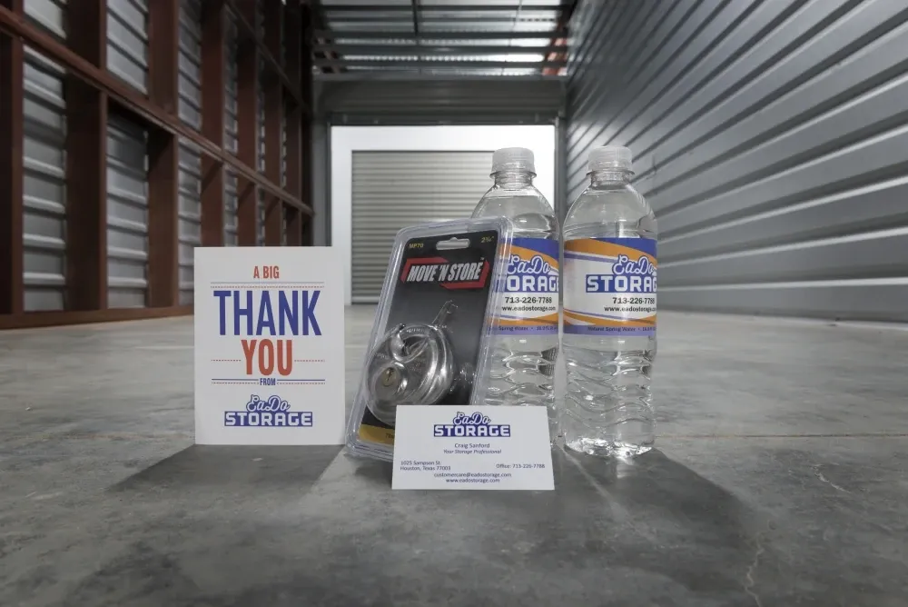 View of water bottles and "thank you" sign at EaDo Storage facility.