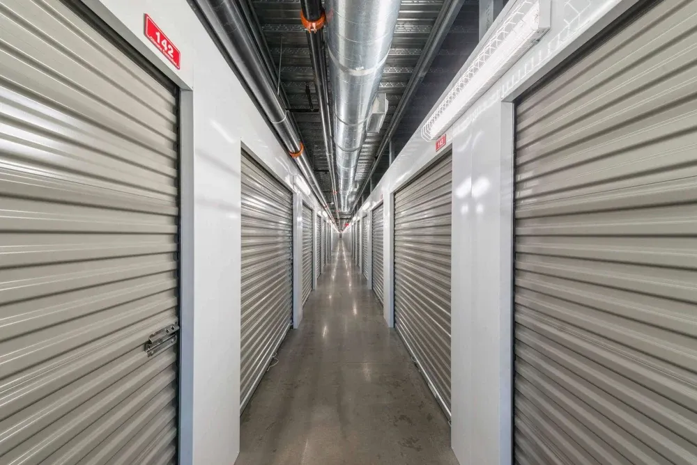 Hallway of climate-controlled storage units at Frisco Self Storage.