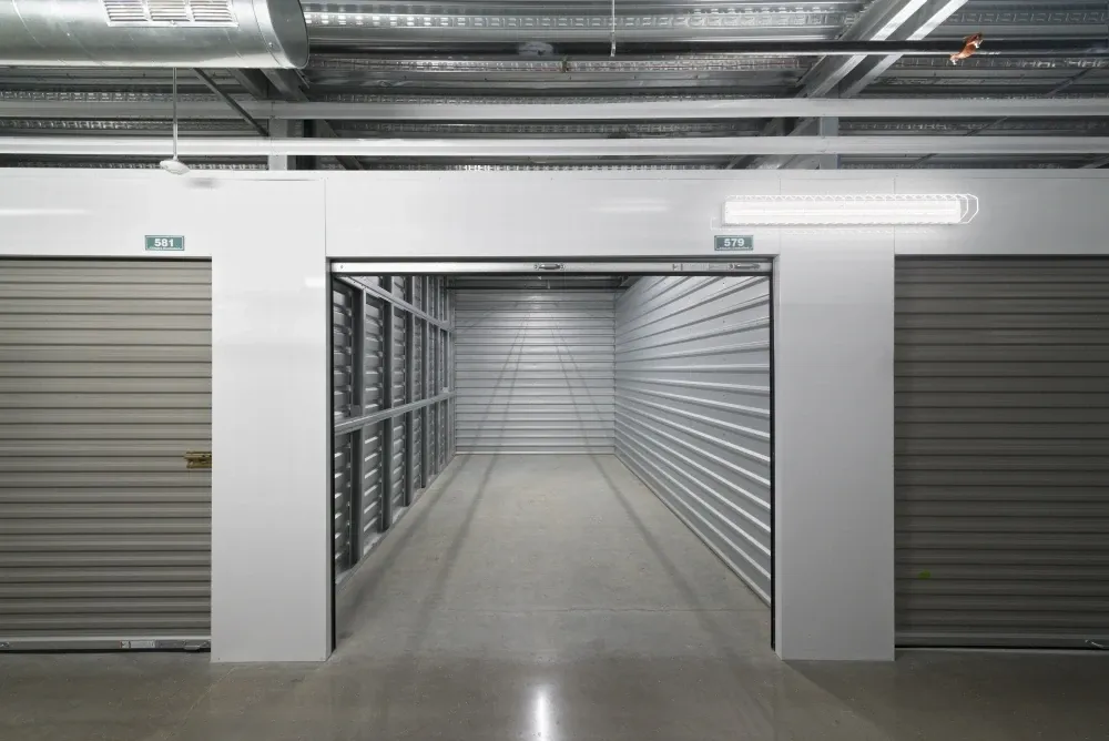 Opened indoor storage unit at the Lakeline Storage facility, showcasing its spacious and secure interior.
