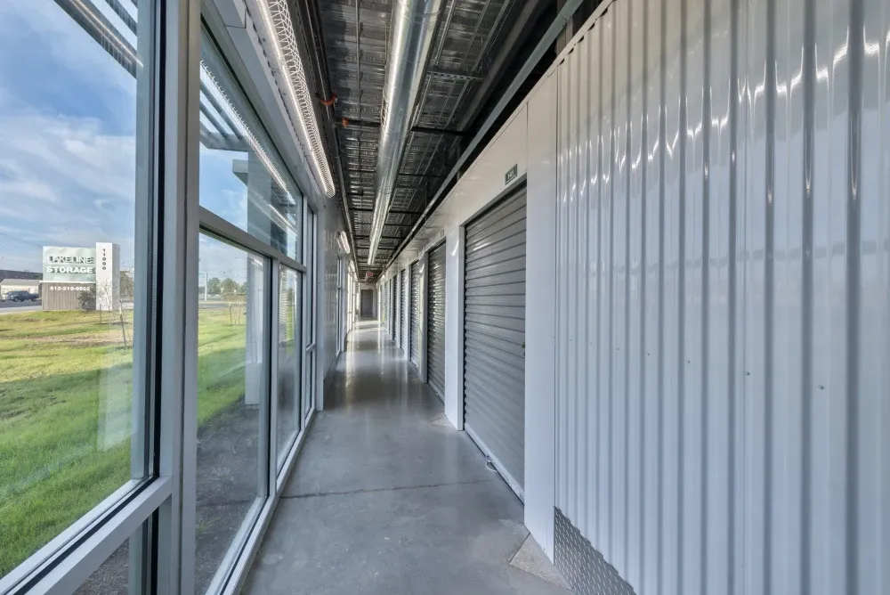 Indoor storage units with window view at Lakeline Storage facility.