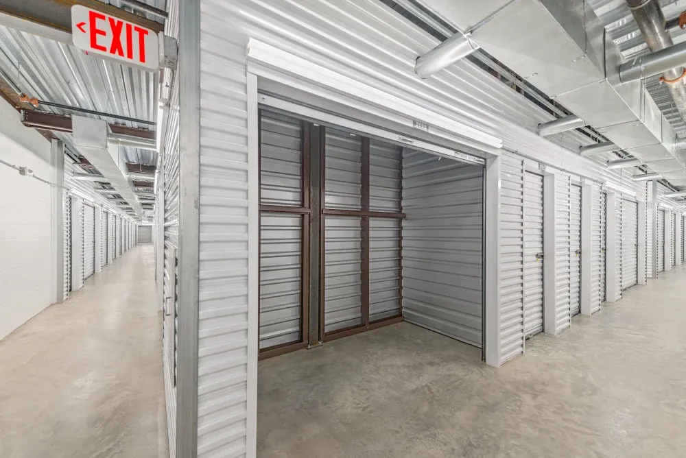Opened indoor storage unit at Memorial Drive Storage facility.