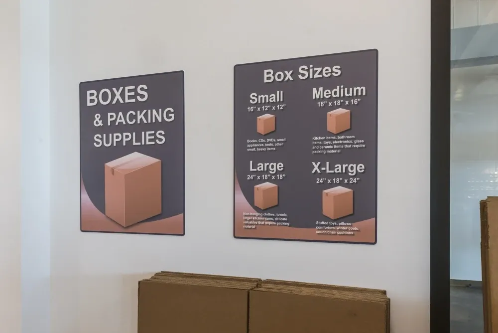 Box supply size poster at Memorial Drive Storage.