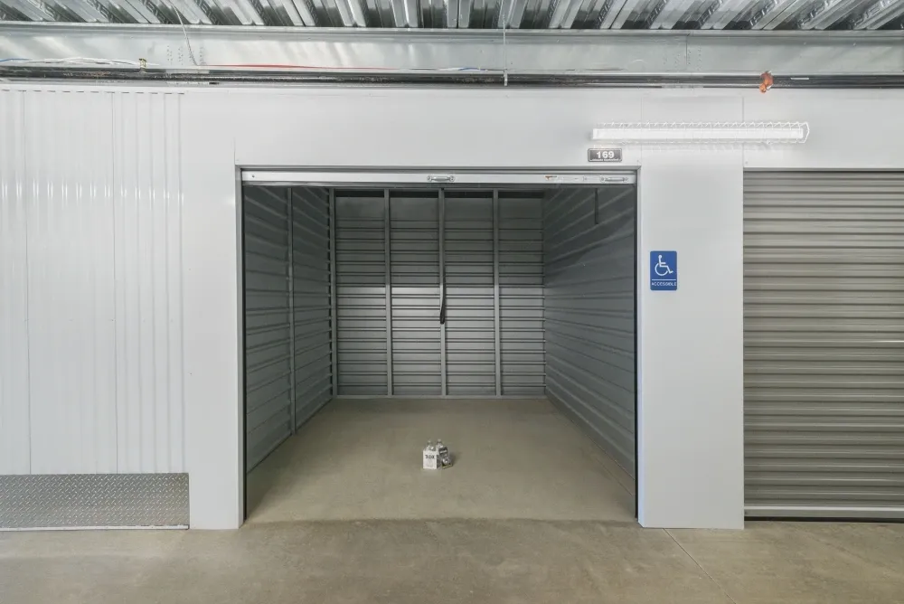 Indoor, climate-controlled open storage unit with roll-up door at Southlake Storage.