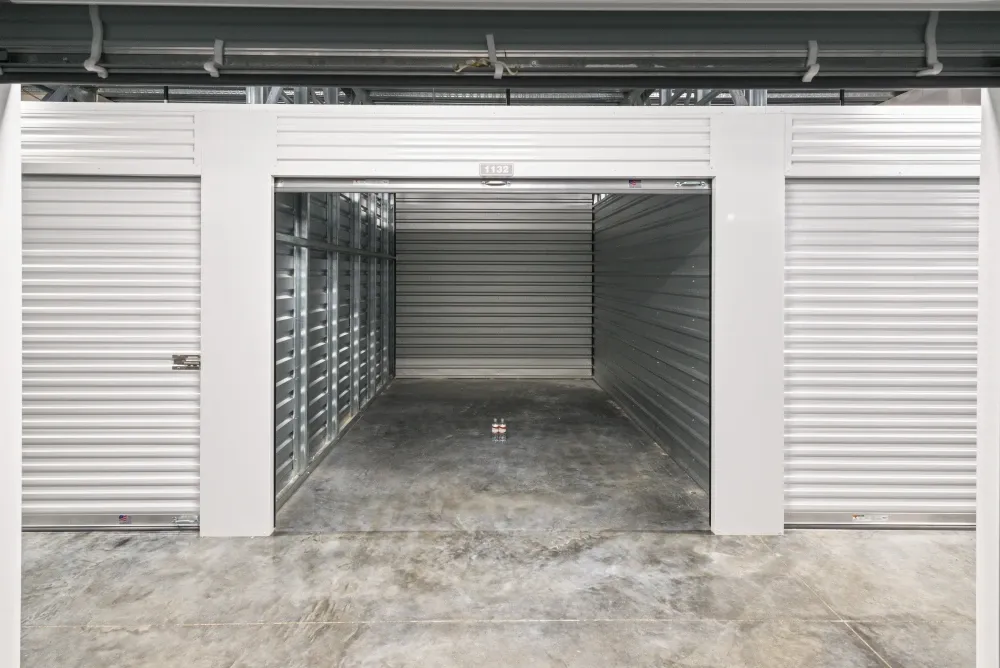 Opened medium, climate-controlled storage unit at Valley Ranch Storage.