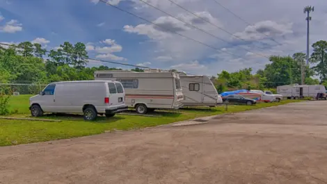 Outdoor RV and vehicle storage at Lakewood Mini Storage.