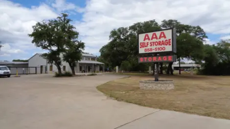 AAA Storage Dripping Springs signage in front of facility.